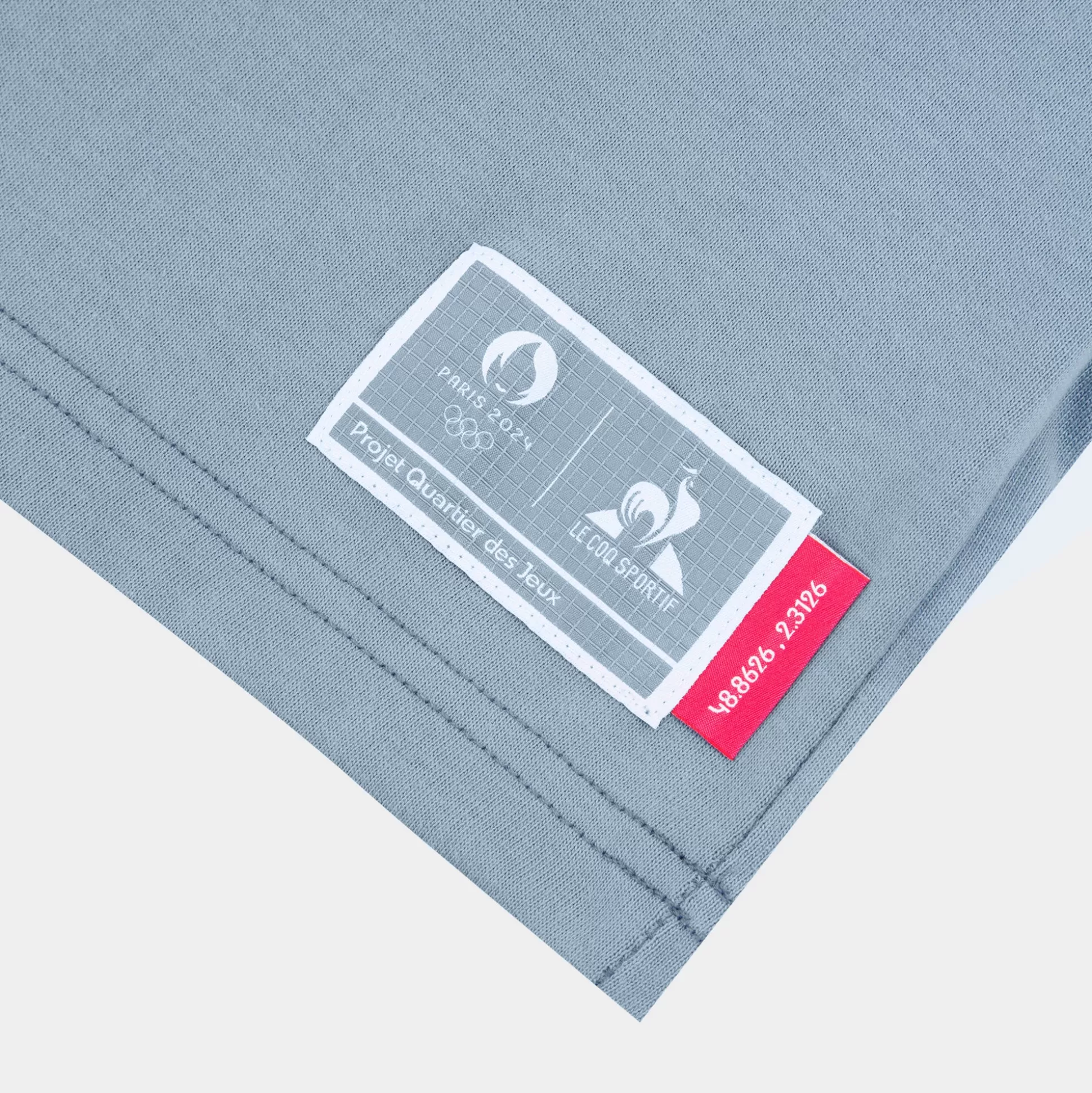 paris___le_coq_sportif_tshirt_capsule_saintdenis_unisexe_6.webp Homme Le Coq Sportif Paris 2024 | T-shirt capsule Saint-Denis Unisexe